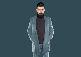 bearded handsome man in casual on grey background