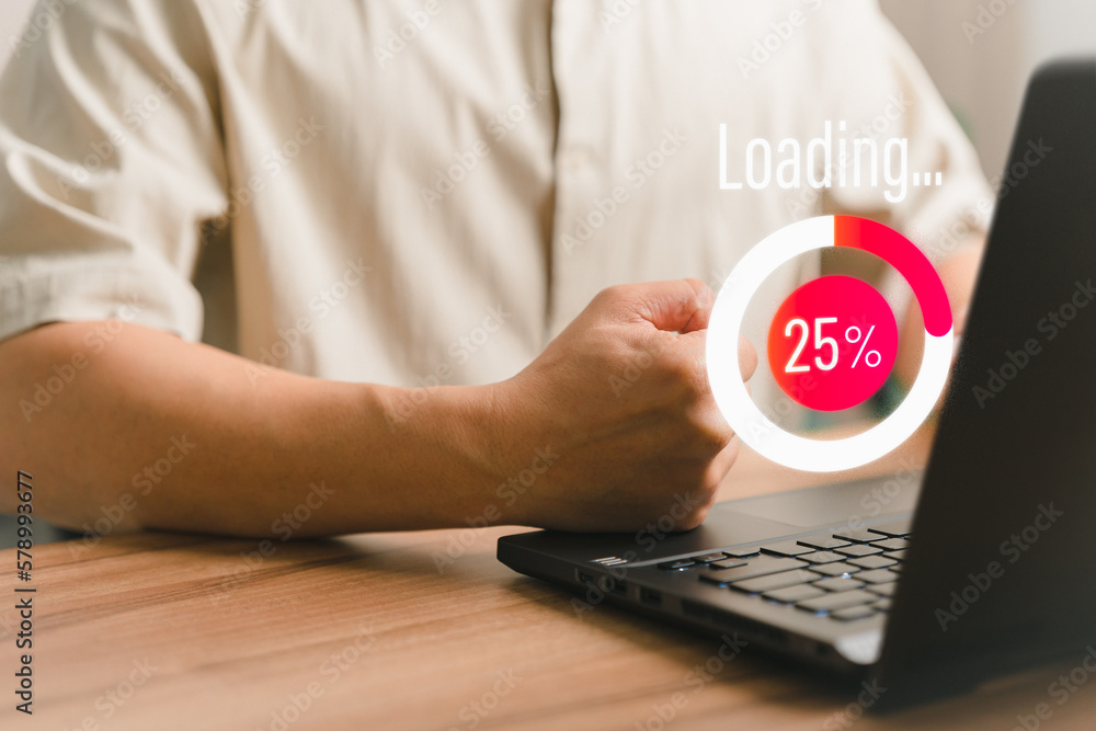 Poster Adult man using a laptop computer for download software and waiting to loading digital business data form website, very slow internet form wifi. Concept of waiting for load of loading symbol.