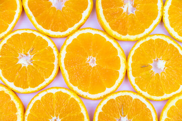 Orange slices close together and on a white background. Orange pulp.