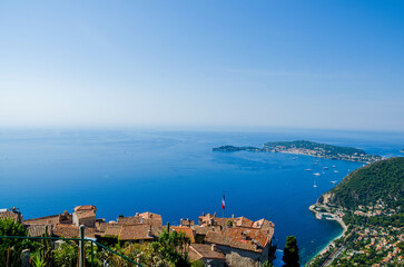 the view from the village of eze on the french riviera coast. in the middle of the botanical garden...