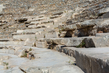 Close up view of marble sits. Ephesus Odeon. The ruins of the ancient city of Ephesus. Selected focus, copy space. Art, design or tourism concept. Selcuk, Turkey (Turkiye)