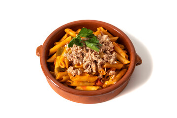 Macaroni pasta with tuna in tomato sauce, served in a clay bowl. Isolated on a white background. Italian food concept.