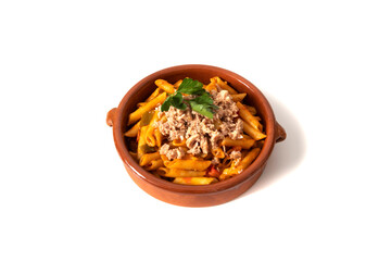 Macaroni pasta with tuna in tomato sauce, served in a clay bowl. Isolated on a white background. Italian food concept.