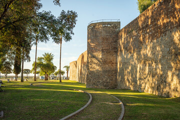 Medieval city wall surrounding Faro downtown, Algarve, Portugal.Medieval city wall surrounding...