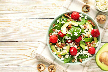 Obraz na płótnie Canvas Concept of tasty salad, salad with strawberry, space for text