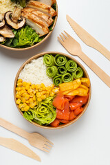 Bowls with tasty and nutritious food, top view