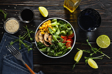 Bowl with tasty and nutritious food, top view