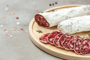 Traditional Spanish Fuet dried sausage. gourmet food. place for text, top view