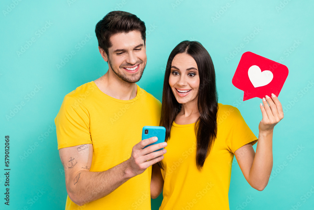 Poster photo of excited funny overjoyed bloggers students hold like symbol read new blog smartphone instagr