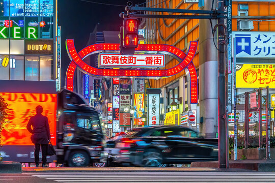 Famous Kabukicho in Shinjuku night district Illuminated by Neon Signs at twilight in Tokyo Japan