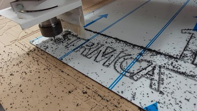CNC Router engraving text on plastic aluminium sandwich plate