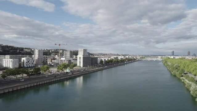 Rh&ocirc;ne river in Perrache district Lyon France with Soleil Avenue and the Viaduct bridge , Aerial rising shot