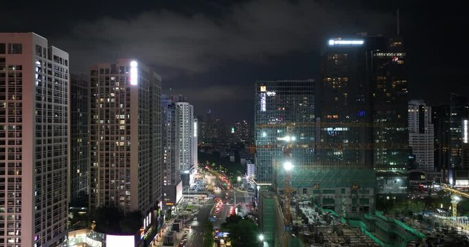 Aerial footage of night cityscape in downtown of shenzhen city, China