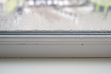 leaks or condensation in windowsill, rain drops on the window, water leaking indoor, high moisture...