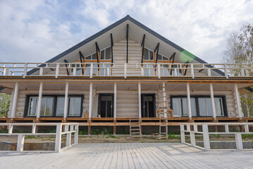 Construction of a new residential building. Wooden construction