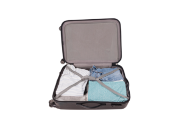Open suitcase packed for trip with transparent background