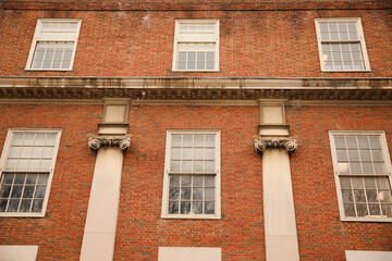 Old brick building apartment and office building in providence rhode island that shows industrial aged factory and architecture with windows 