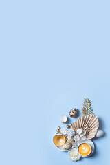 Modern creative composition with coffee cup. easter eggs, palm leaves and flowers top view. Easter flat lay