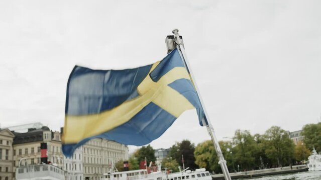 A swedish flag blos in the wind