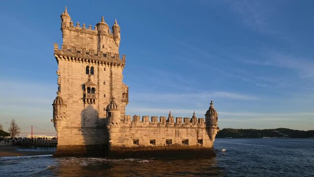 Belem Tower or Tower of St Vincent - famous tourist landmark of Lisboa and tourism attraction - on the bank of the Tagus River (Tejo) on sunset. Lisbon, Portugal