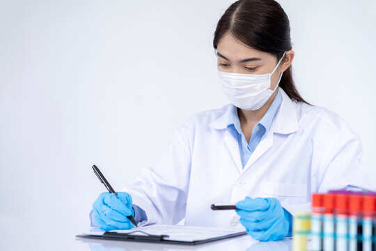 Young female scientist working  in the laboratory