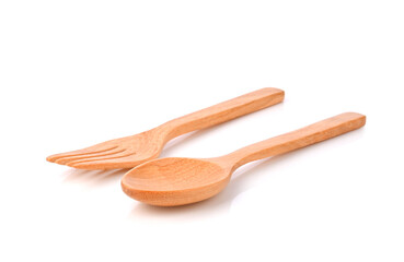 Wooden spoon and fork on white background