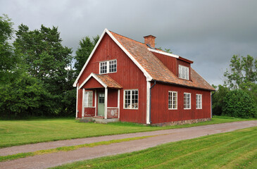 Fototapeta na wymiar Red wooden house in Sweden