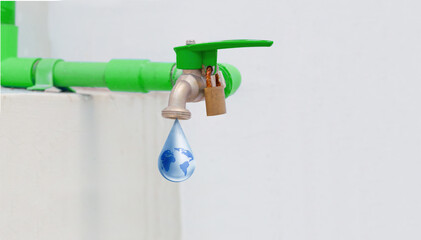 Green water tap lock up with water drop and world map in the water, Save water save world nature day concept