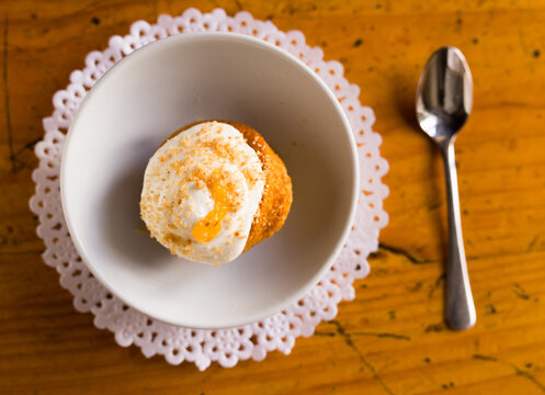 Homemade Carrot Cake With Orange Crumbs On Plate Close-up