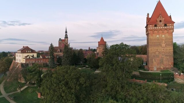 fly up the chapter tower with a view of downtown Tangerm&uuml;nde. Downtown at sunrise.