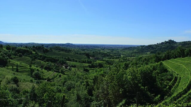 Pyramids and valley of Montavecchia and Valle del Curone. Aerial panoramic view of the valley and its vineyards and farmhouses. Green and luxuriant landscape. Lombardy environment.