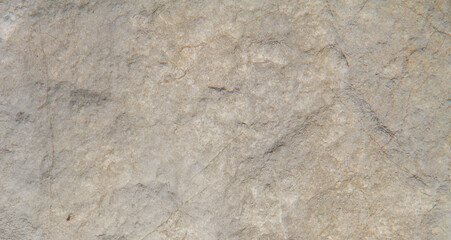 Natural marble background with gray curly veins, beige marble for exterior house decoration and ceramic tile floor.