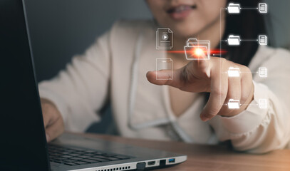 Document Management System (DMS), Businesswoman finger touch digital device,  online storage of...