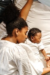 mother and her baby sleeping.