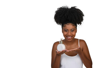 woman holding jar with cream smiling looking at camera
