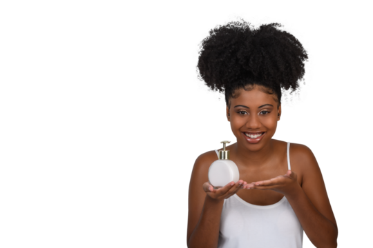 woman holding jar with cream smiling looking at camera
