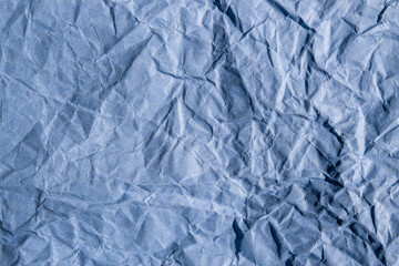 Crumpled paper background. Wrinkled surface for designs.