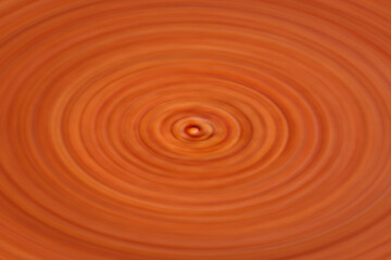 Fototapeta na wymiar Abstract orange background with circle blur effect