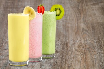 Set of tasty fresh various milkshakes with berries