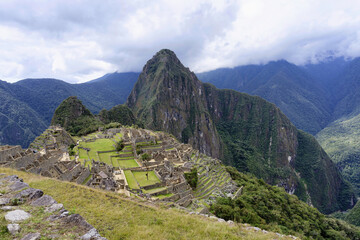 Fototapeta na wymiar Machu Picchu, Ruined city of the Incas with Mount Huayana Picchu, Andes Cordilleria, Urubamba province, Cusco, Peru