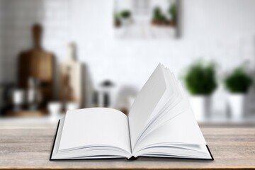 Home interior with open book on desk