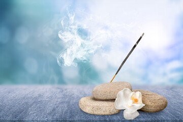 Aroma incense sticks with smoke on the desk