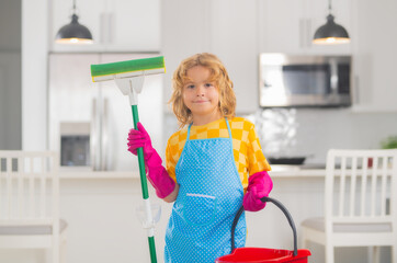 Child mopping house, cleaning home. Detergents and cleaning accessories. Cleaning service. Little boy housekeeping.