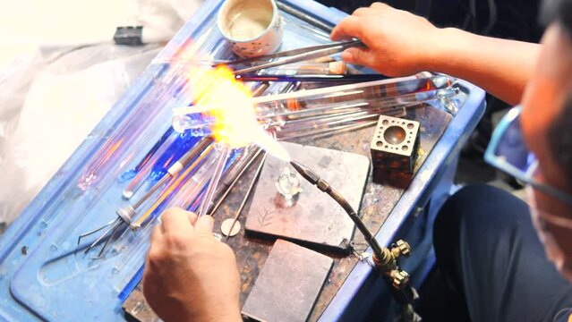 Glassblower Craftsman Making Souvenirs From Hot Glass, High Quality 4K Slow Motion Industrial Profession Concept Footage, Thailand.