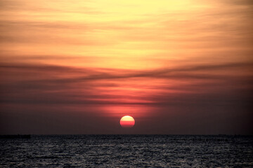 sunset in the sea | so beautiful scenery | A nice sight.  Looks very nice|