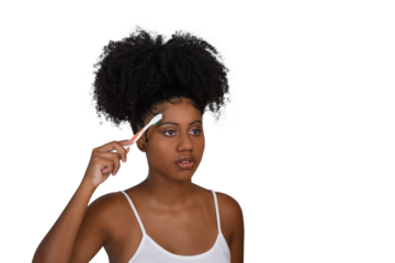 woman doing a baby hairstyle on her afro hair