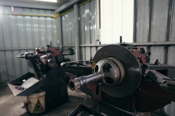 Background of lathe machine in the auto repair shop or industrial factory