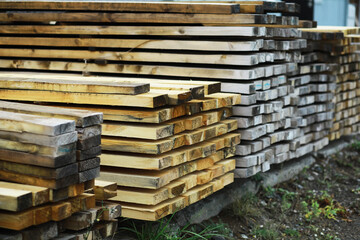 Outdoor lumber storage for the timber industry. Wood processing for both land and water transportation.