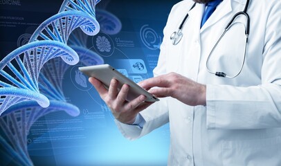 Young chemist with digital tablet and dna structure