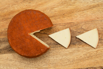Produce of Gran Canaria - speciality goat semi cured milk cheese with paprika covering